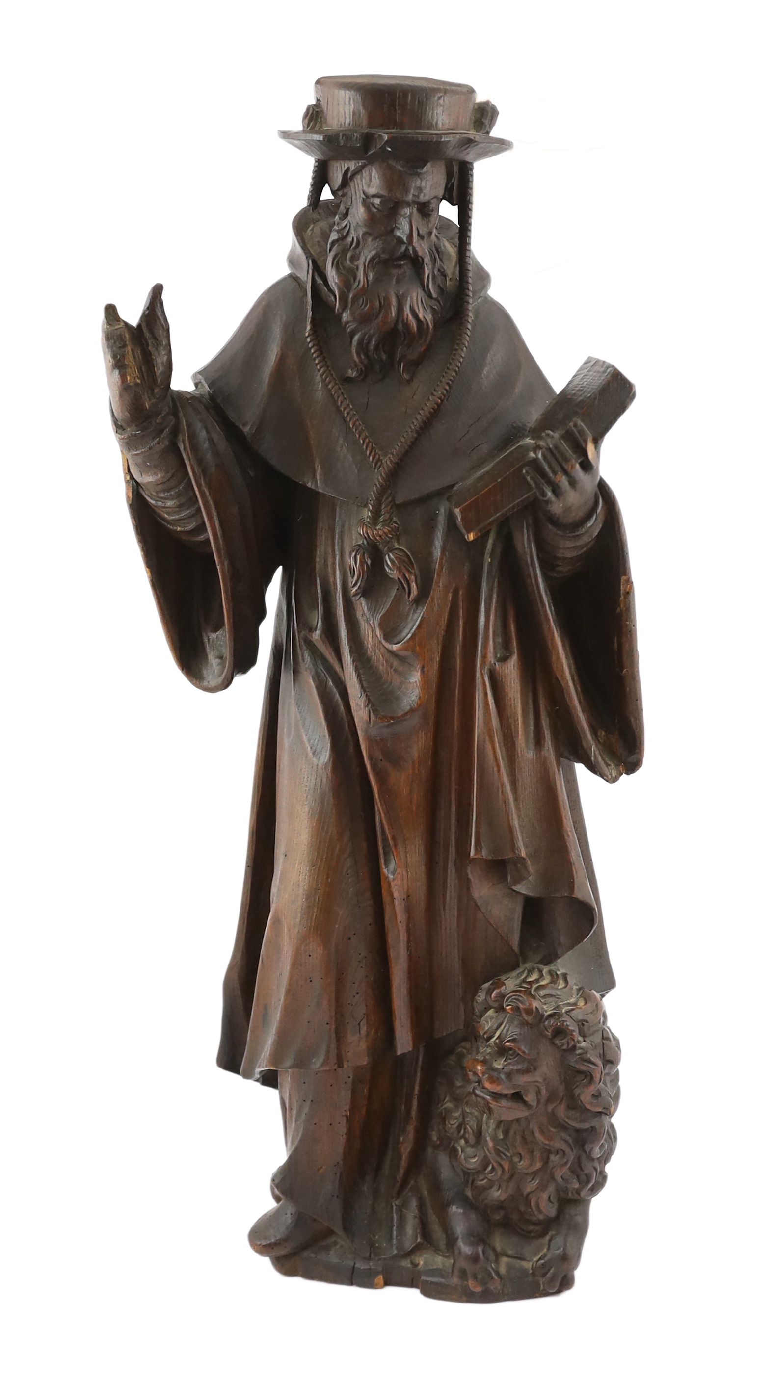 A 19th century carved pine figure of St. Jerome reading from the bible 32cm wide, 79cm high
